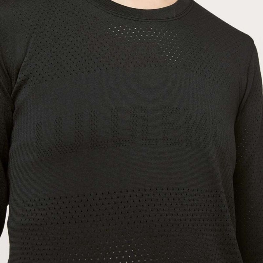 Rare Lululemon Breeze by long sleeve Lululemon across chest black size 4